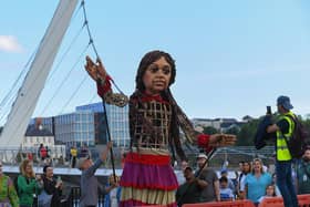 Global human rights icon Little Amal greets on lookers on Monday afternoon. Photo: George Sweeney