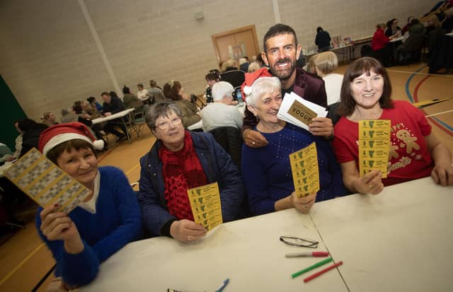 Bingo MC Micky Doherty pictured with Bernie Gallagher, Robin Meenan, Bridie McGlinchey and Molly Lynch. : .