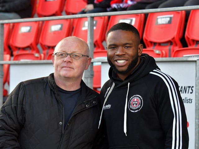 Former Derry City striker James Akintunde pictured with Packie Cooke at the Brandywell on Monday evening. Photo: George Sweeney. DER2315GS – 95