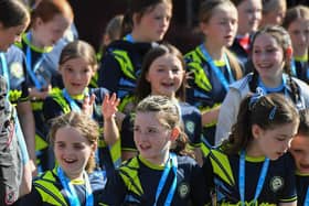 The 2024 Foyle Cup parade makes its way along Northland Road, towards Guildhall Square, on Monday morning.  Photo: George Sweeney