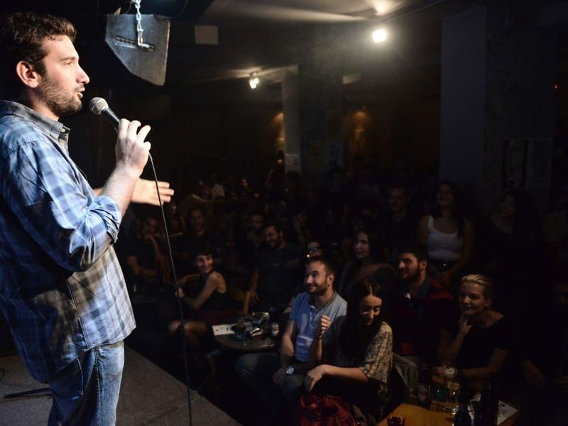 Every Thursday this month, Bennigans will present free stand-up comedy nights from 8:30 pm to 11:00 pm.  / AFP PHOTO / SAKIS MITROLIDIS        (Photo credit should read SAKIS MITROLIDIS/AFP via Getty Images)