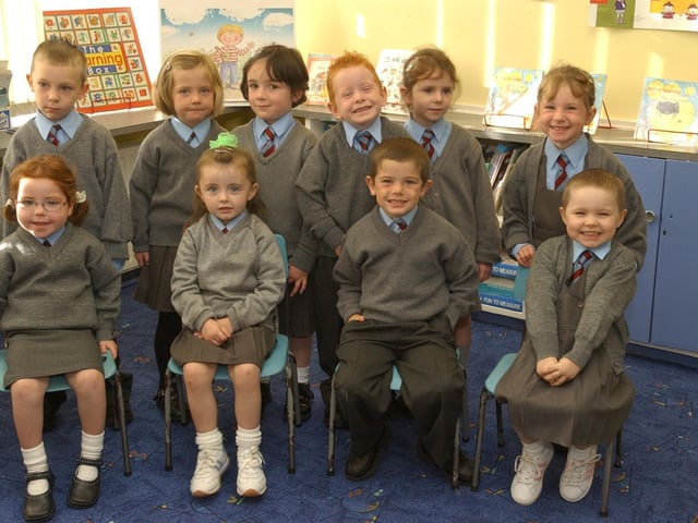 Primary 1 pupils from Mullabuoy Primary School. Included, seated from left, Cara Cassidy, Caitlin Rankin, Niall O'Donnoll, and Corah Doherty. Standing, from left, Jack O'Hara, Jessica McCaffrey, Meabh Cassidy, Ronan Rankin, Siobhan Lynch, and Nadia Cussack. (2609PG02):20 years on: Young people across Derry and Donegal starting school in September 2003