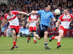 Dublin's Michael Dara Macauley tries to break past Derry duo Benny Heron and Mark Lynch in Celtic Park back in 2014. (Photo Lorcan Doherty / Presseye.com)
