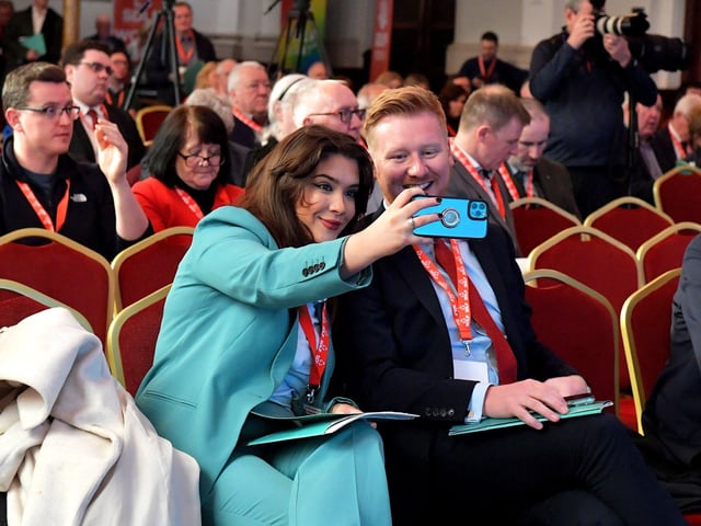 Cara Hunter MLA takes a selfie with Daniel McCrossan MLA at the SDLP annual Conference, on Saturday morning, in St Columb’s Hall. Photo: George Sweeney. DER2312GS – 39
