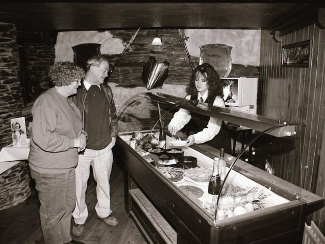 Staff and customers at Duke's Bar in the Waterside.