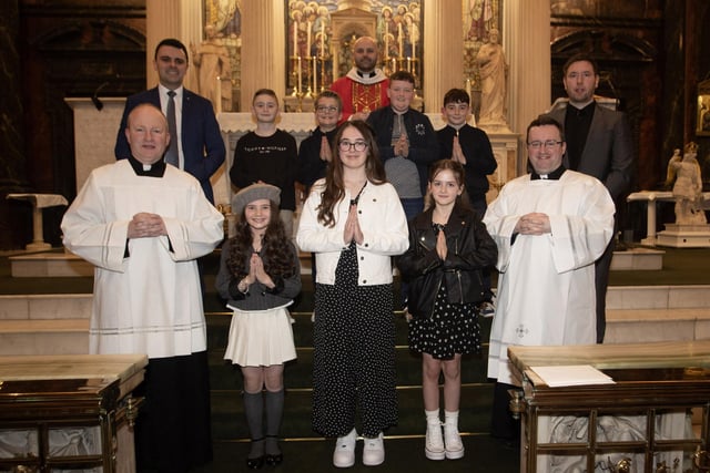 Pupils from Ballougry Primary School who received the Sacrament of Confirmation from Fr. Chris McDermott at Long Tower Church on Thursday evening last. Included at front are Fr. Gerard Mongan and Fr. Stephen Ward. At back are Mr. O'Kane, Principal, Ballougry and Mr. Kane, P7 teacher. (Photos: Jim McCafferty Photography)