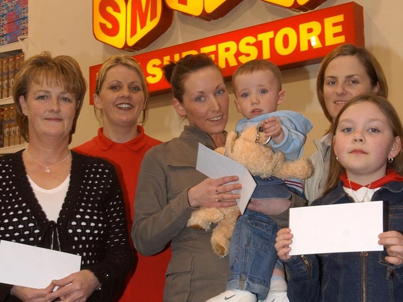 Prizewinners pictures after being presented with their prizes in a free prize draw at Smyths Toys. included are Carol Mallett, Laura Deery and Oran Doherty, Kayleigh Mallet, Ciara Crawford, customer services, and Catherine McCaul, floor manager.