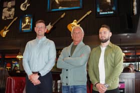 Paul Weller called into Link 47 in Derry’s Waterside on Tuesday for the unveiling of a new canvas tribute to Eamon Friel. On right is Eamon's son Colum.