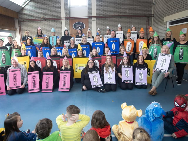 St. Brigid's PS Principal Ms. Mary McCallion and her staff joining in celebrating World Book Day with the pupils on Thursday last. (Photos: Jim McCafferty Photography)