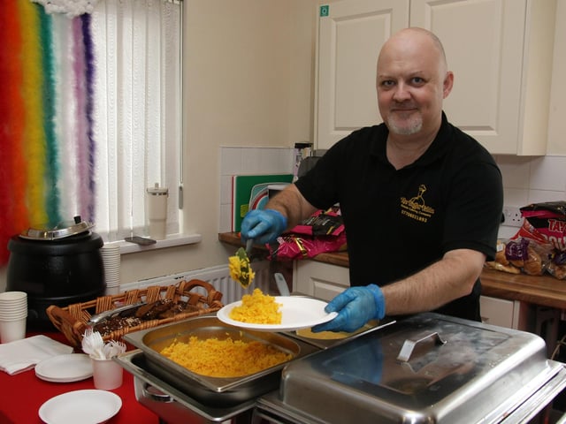 Tom Boyle the Buffet Table at “Rooted in Wellness” annual Big Lunch & Health Event at Farland Way (Photo - Deirdre Heaney, nwpresspics) : .
