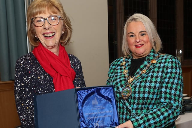 Mayor Sandra Duffy presenting a commemorative piece of crystal to Judith O'Hare, chairpers, LMS at a civic reception in the Whittaker Suite in the Guildhall to mark their 60th anniversary of the Londonderry Musical Society. (Photo - Tom Heaney, nwpresspics)
