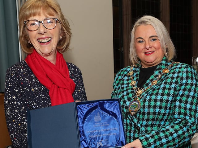 Mayor Sandra Duffy presenting a commemorative piece of crystal to Judith O'Hare, chairpers, LMS at a civic reception in the Whittaker Suite in the Guildhall to mark their 60th anniversary of the Londonderry Musical Society. (Photo - Tom Heaney, nwpresspics)