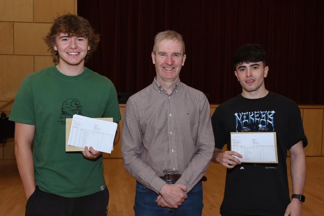 Mr FJM Madden, St Columb's College Principal, pictured with A Level students, Oran Canning and Adam Mason recieving their exam results on Thursday morning.