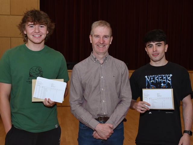 Mr FJM Madden, St Columb's College Principal, pictured with A Level students, Oran Canning and Adam Mason recieving their exam results on Thursday morning.