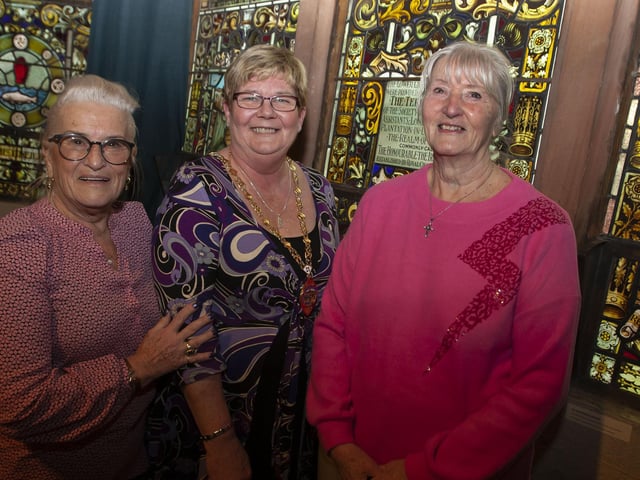 Dolores Barr and Angela Cassidy pose for a pictured with Deputy Mayor Angela Dobbins on Wednesday afternoon.