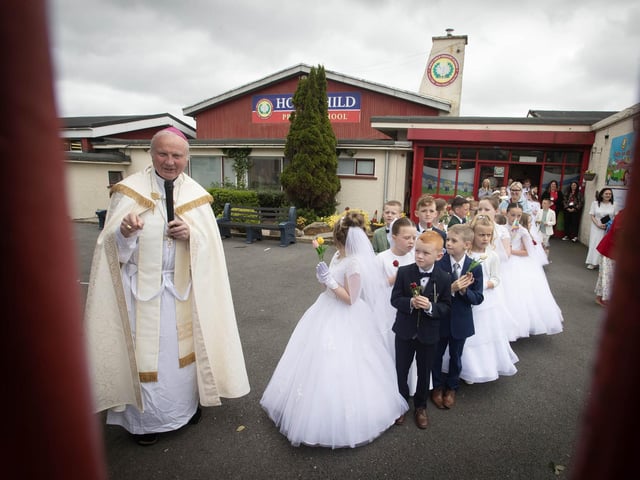 Bishop Donal McKeown addresses the parents at the gates before starting Thurday's May Procession at Holy Child PS.