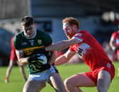 Derry’s Conor Glass tackles Diarmuid O’Connor of Kerry. Photo: George Sweeney