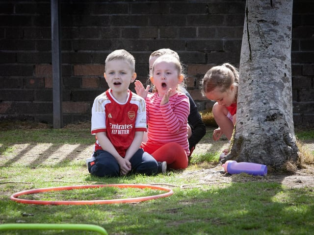 Some of the younger children showing their support during Greenhaw PS Sports Day.