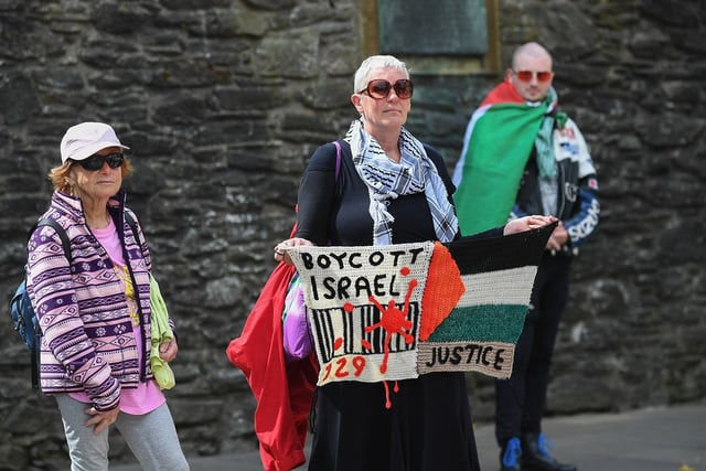 People gather at a rally in Guildhall Square, organised by the Derry Branch of Ireland Palestine Solidarity Campaign to mark 300 days of Genocide in Gaza. Photo: George Sweeney