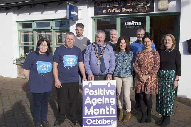 Pictured at the launch of the Chatty Café at Curran’s Bakery and Coffee Shop in Greysteel are (L-R) Siobhan & Felim Curran, owners of Curran’s Bakery and Coffee Shop, the Mayor of Causeway Coast and Glens Borough Council, Councillor Ivor Wallace, Maureen Duffy Western Trust GP Federation, Tori Calderwood from COAST and Gabrielle Quinn, Causeway Loneliness Network. Back row, right to left, coffee shop customer Davie, Councillor Dermot Nicholl, and Liam Hinphey Age Friendly Co-ordinator at Causeway Coast and Glens Borough Council.