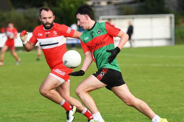 Cathan Duffy powers forward for Doire Trasna during Friday evening's match against Magilligan. (Photo: Keith Moore)
