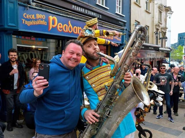 Enjoying the craic and music in Waterloo Street over the Jazz Festival weekend. Photo: George Sweeney. DER2217GS – 084