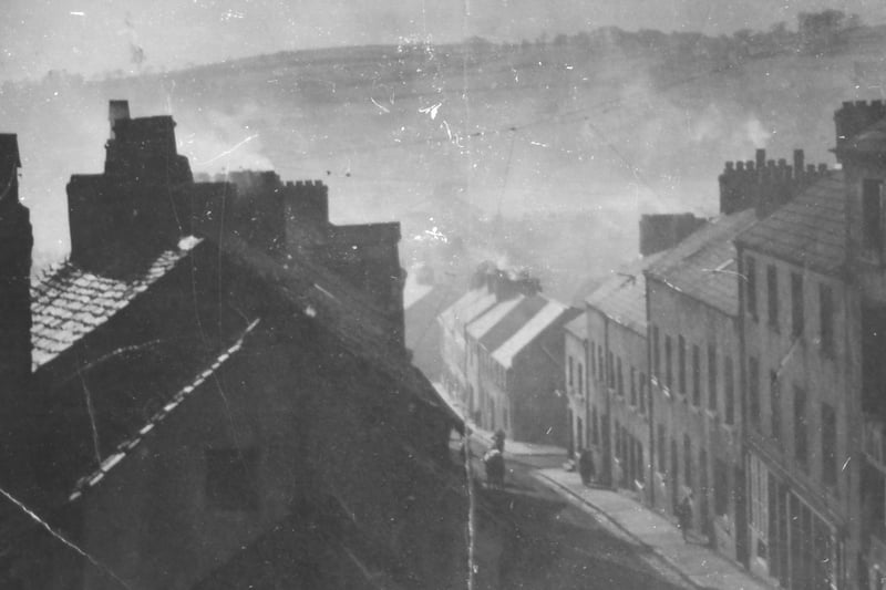 Wonderful atmospheric shot of Fahan Street as viewed from the top of Butcher Gate in the early 1940s. Notice the long wire radio aerials criss-crossing the street.