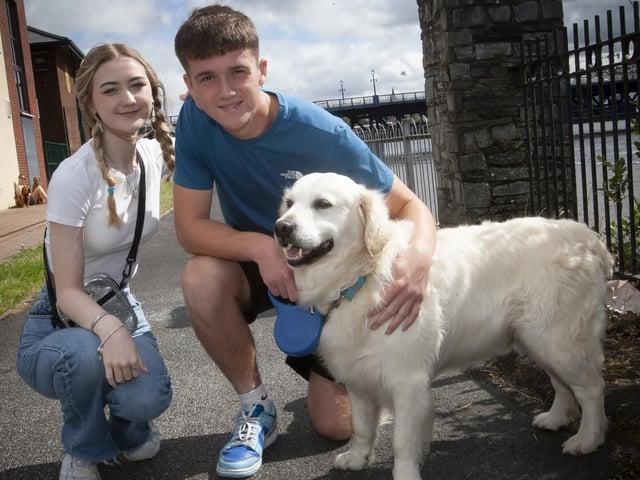 Kyle McCloskey and Christina McKeever with ‘Charlie’ before Saturday’s walk.