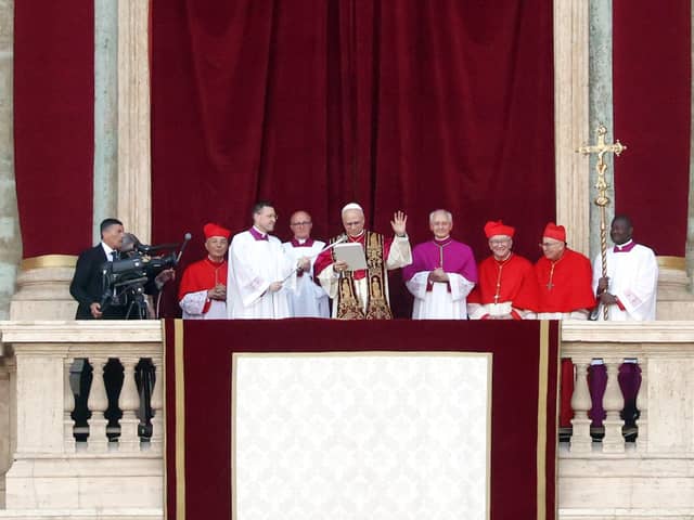 VATICAN CITY, VATICAN - MAY 8: The newly elected Pontiff, Pope Leo XIV is seen for the first time from the Vatican balcony on May 8, 2025 in Vatican City, Vatican. Cardinal Robert Prevost will be known as Pope Leo XIV. White smoke was seen over the Vatican early this evening as the Conclave of Cardinals took just two days to elect the new Pontiff after the death of Pope Francis on Easter Monday. (Photo by Dan Kitwood/Getty Images)