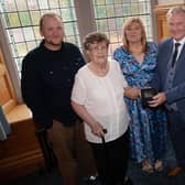 Retired bus driver Jim Kelly pictured with his family at the Guildhall on Thursday evening.