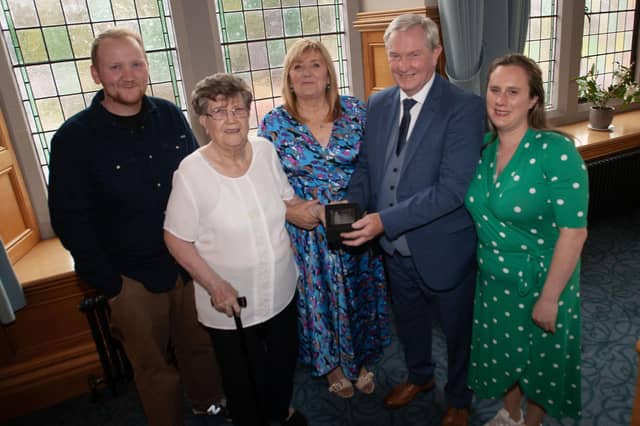 Retired bus driver Jim Kelly pictured with his family at the Guildhall on Thursday evening.