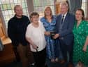 Retired bus driver Jim Kelly pictured with his family at the Guildhall on Thursday evening.