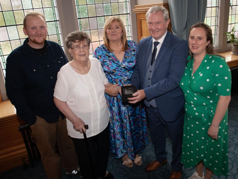 Retired bus driver Jim Kelly pictured with his family at the Guildhall on Thursday evening.