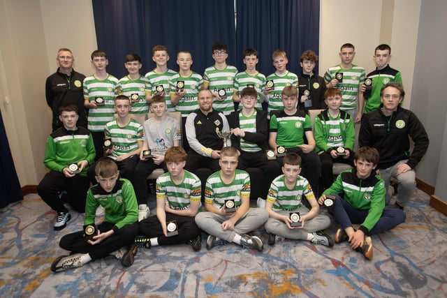 Ronan O'Donnell, Irish Football Association, special guest, presenting Top of the Hill Celtic u-14s with the Summer Cup at the D&D Youth Awards at the City Hotel on Friday night last. Included are coaches Emmett O'Neill and Brian Mulgrew.