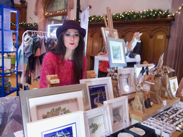 Leona Devine with her art on display.