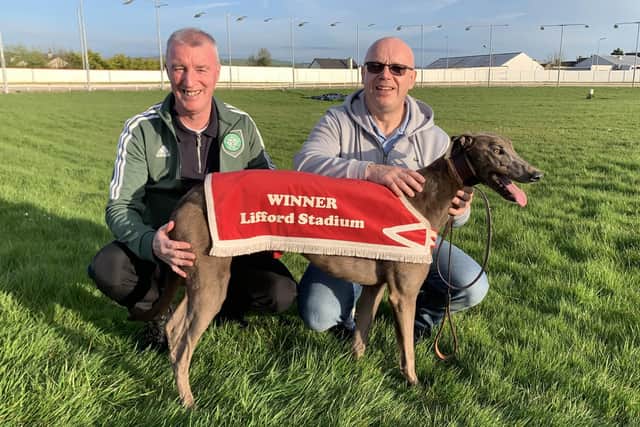 The NW Greyhound Supplies A2/A3 Heat 4 (525 yards) winner 'No sock Gar' with Patrick McIntyre (left) & Danny Mc Gilloway.