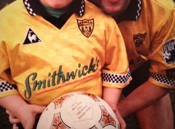 RTE 2FM presenter and Dancing with the Stars finalist Carl Mullan as Derry City mascot with skipper Peter Hutton ahead of the 1997 FAI Cup Final at Dalymount.