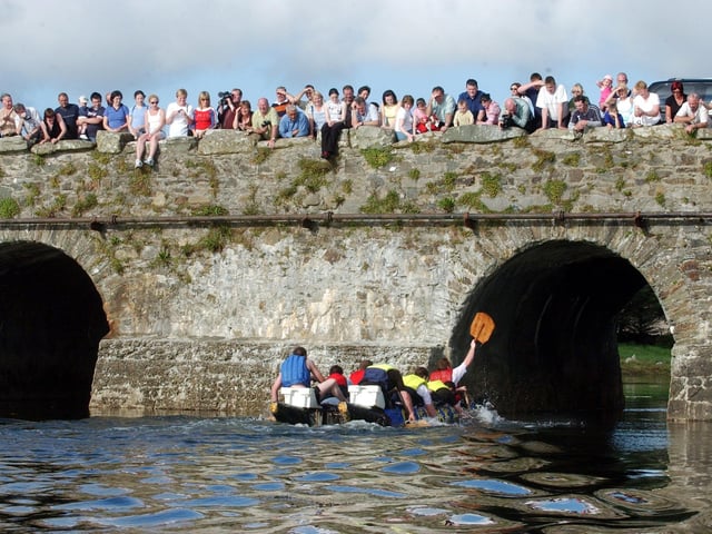 The crowd watches Malin Raft Race from Malin Bridge.