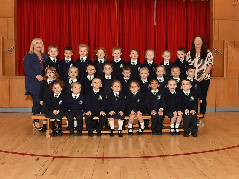 Mrs Hanley (right) teacher and Miss Cairns classroom assistant pictured with P1 pupils at St Patrick’s Primary School.