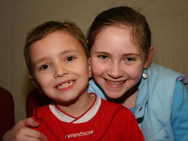 Aidan Dunne with his cousin Amy enjoying the party. 2162/dd : Parties and celebrations January 2006: Aidan Dunne.