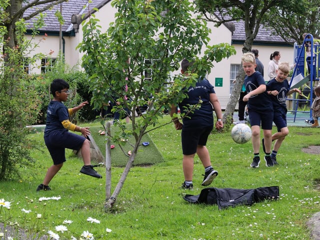 P5 playing soccer in the garden at the Family Fun Day held in Longtower School playground. (Photo - Deirdre Heaney, nwpresspics)