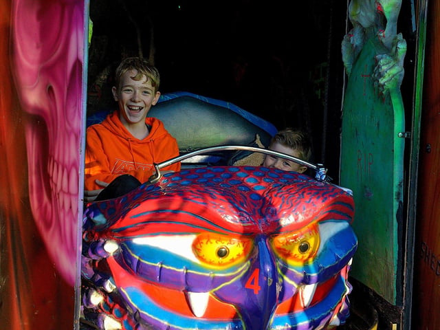 Brave lads emerge from the roller ghoster at Cullen's Halloween Funfair in Ebrington Square. Photo: George Sweeney.  DER2243GS – 057