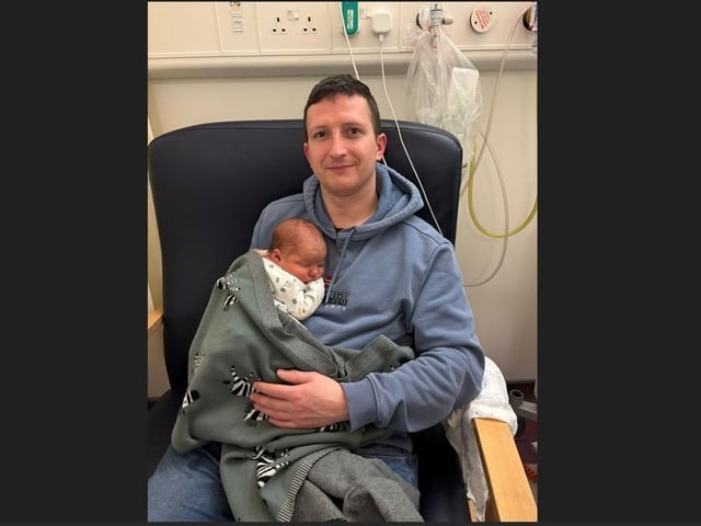 Baby Tommy with dad Gordon and son of Jade from Castlederg born on News Year's Eve at Altnagelvin Hospital at 10:07am weighing 8lb and 6oz.