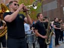 The Hyde Park Brass Band performs at the Millennium Forum Piazza over the Jazz Festival weekend. Photo: George Sweeney.  DER2217GS – 090