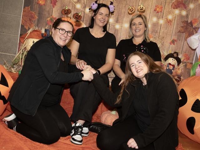 Some of the ladies who helped out at Monday's Feile/Surestart (Edenballymore) Halloween Fun Day at the Long Tower Youth Club.
