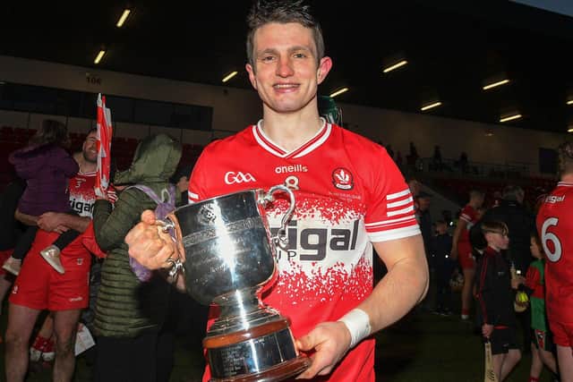 Derry captain Cormac O’Doherty with the Division 2 trophy. Photo: George Sweeney
