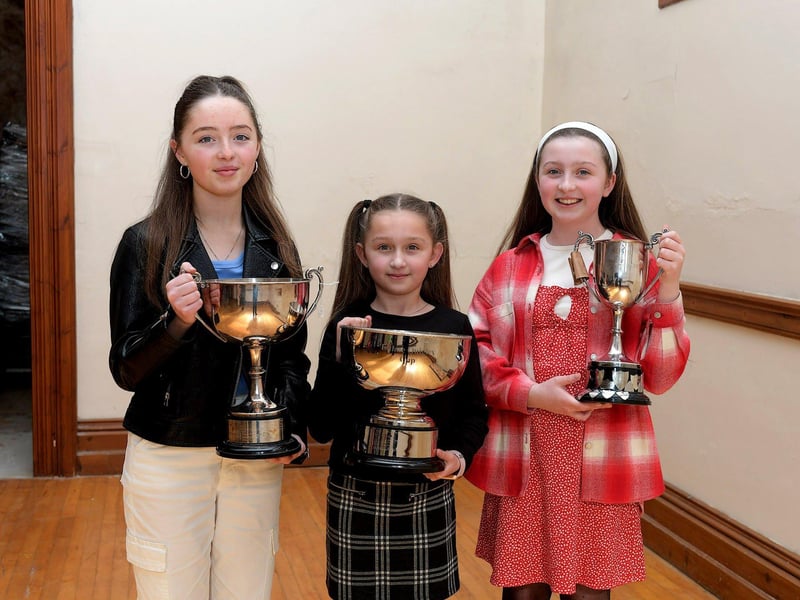 May Connolly, Bishop Hegarty Cup and Annie Morgan Bursary winner, Eva Connolly winner the Una McGinley Cup and Elowen Connolly winner of the Eithne Quigley Cup and Bursary at the Feis Dhoire Cholmcille at St Columb’s Hall. Photo: George Sweeney.