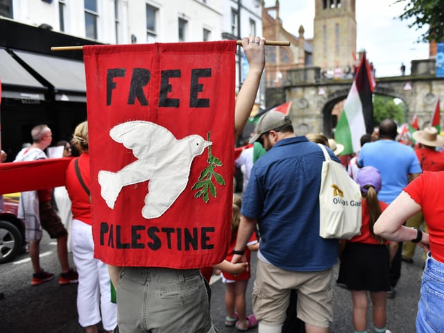 Banner carried at the ‘Turn Shipquay Street Red for Gaza’ march on Saturday afternoon. Photo: George Sweeney