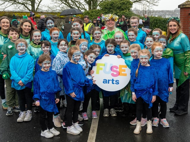 The Deputy Mayor, Alderman Nyree McMorris pictured with dancers from Fuse Arts at the St. Patrick's Day parade in Derry
The annual St. Patrick’s Day Spring Carnival took to the streets of Derry on Tuesday as the annual celebration brought entertainers into the city centre before a parade watched by thousands made its way down Shipquay Street past the historic Guildhall. Picture Martin McKeown. 17.03.26