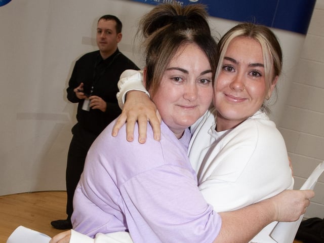 Ellie Williams gets a big hug from mum Lisa after getting her GCSE results at St. Mary's College.